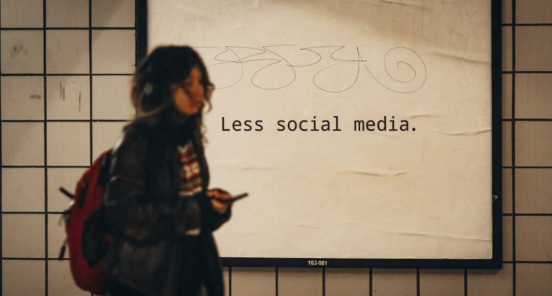 a woman standing in front of a sign that says less social media